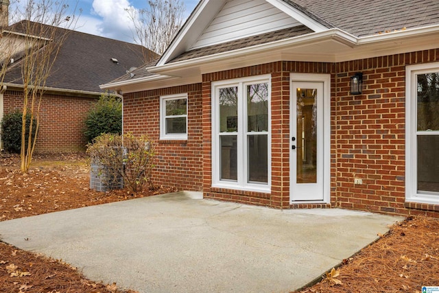 property entrance with a patio