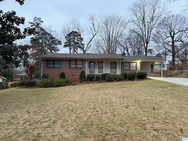 single story home with a porch and a front yard