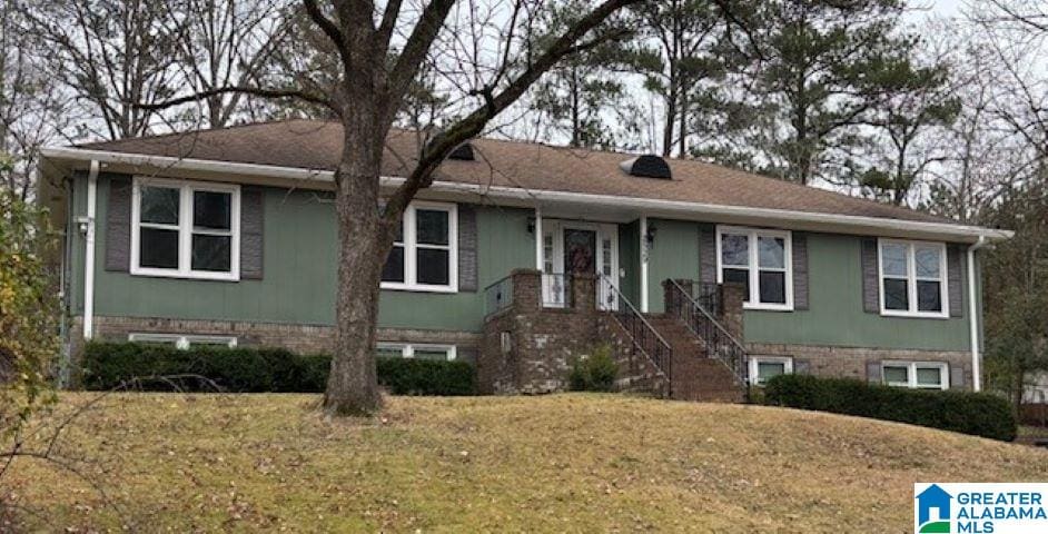 view of front of home with a front yard