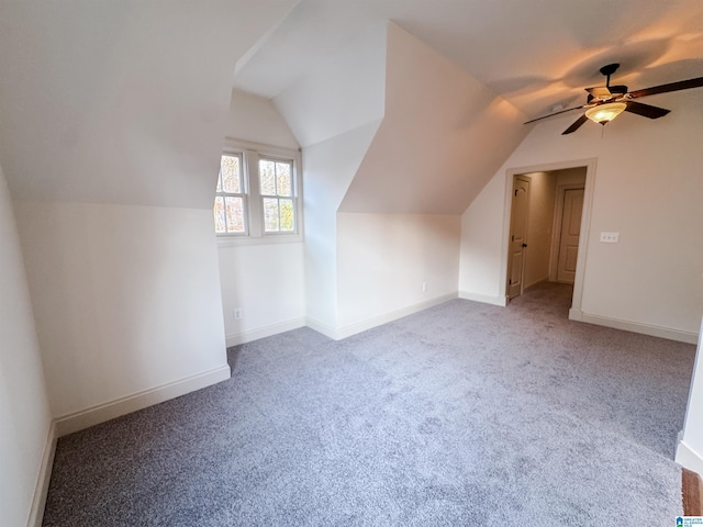 bonus room with carpet flooring, ceiling fan, and lofted ceiling