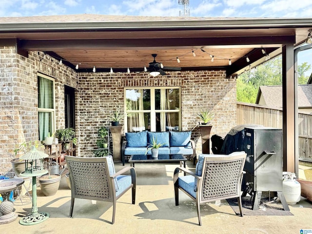 view of patio featuring outdoor lounge area and ceiling fan