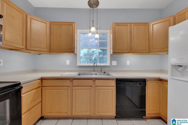 kitchen with light brown cabinets, sink, decorative light fixtures, and black appliances