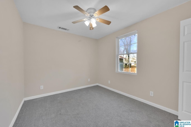 unfurnished room with carpet and ceiling fan