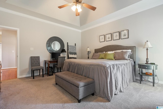 carpeted bedroom featuring ceiling fan and ornamental molding