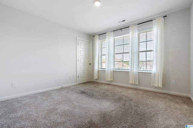 view of carpeted spare room