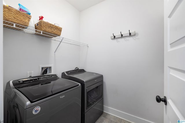 laundry area featuring independent washer and dryer