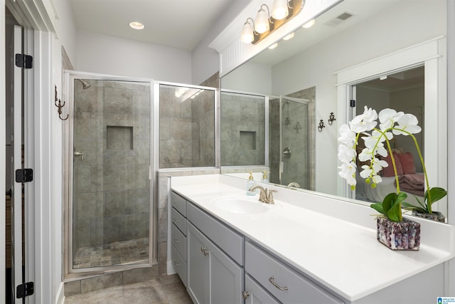 bathroom with vanity and walk in shower