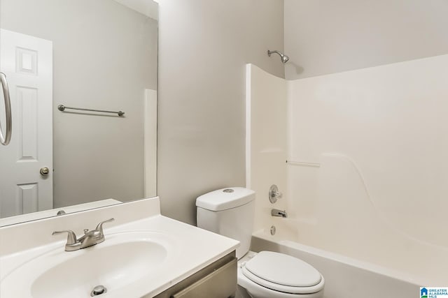 full bathroom featuring vanity,  shower combination, and toilet