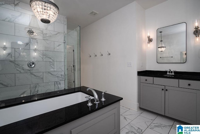 bathroom with vanity, plus walk in shower, and a chandelier