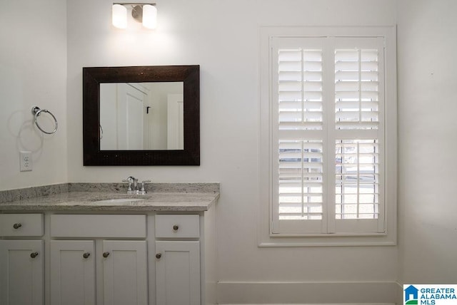 bathroom featuring vanity