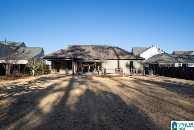 back of house featuring french doors