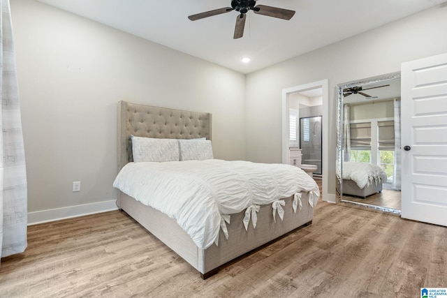 bedroom with ceiling fan, light hardwood / wood-style flooring, and ensuite bath