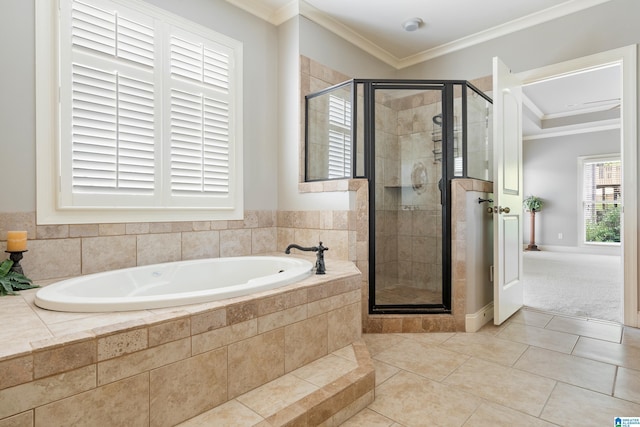 bathroom featuring shower with separate bathtub, tile patterned floors, and crown molding