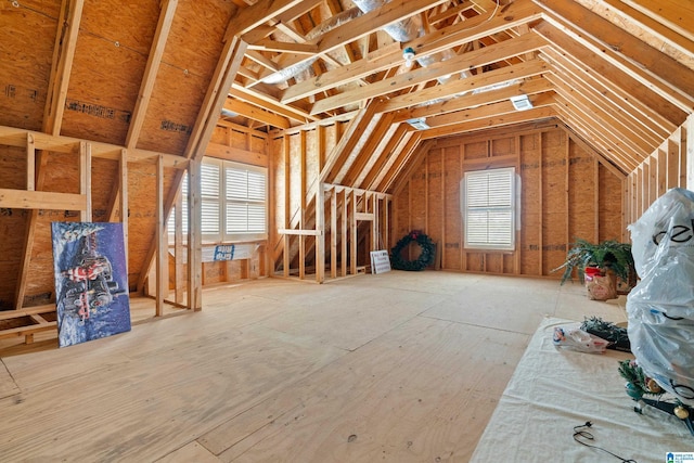 unfinished attic with a healthy amount of sunlight