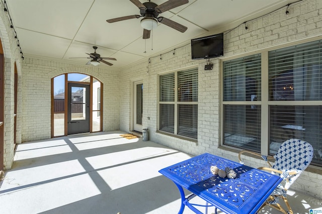 view of patio with ceiling fan