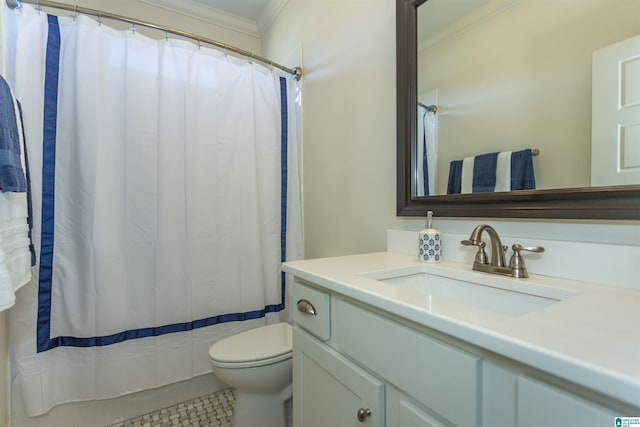 bathroom with tile patterned floors, crown molding, vanity, and toilet