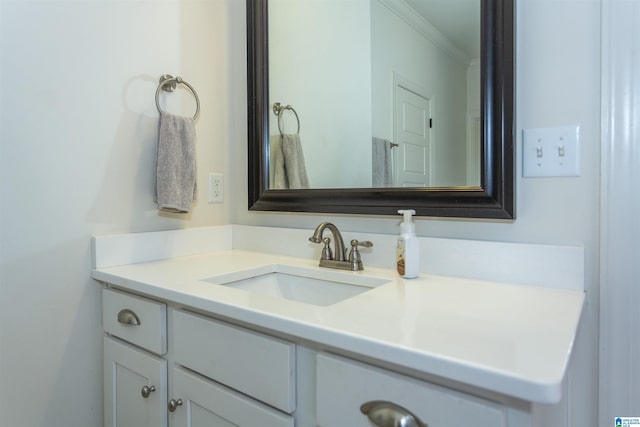 bathroom featuring vanity and crown molding