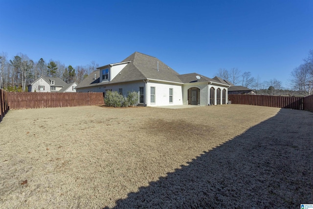 rear view of property with a patio area