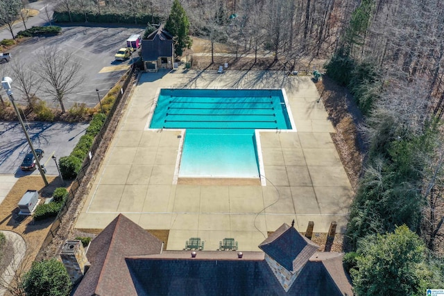 view of swimming pool featuring a patio area