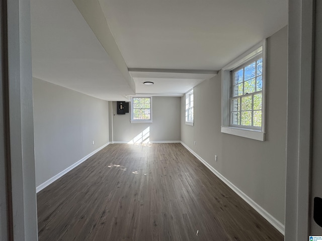 spare room with dark hardwood / wood-style flooring