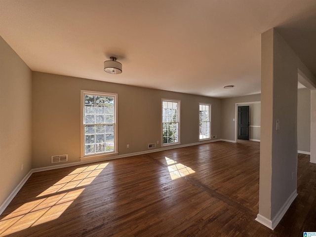 spare room with hardwood / wood-style floors