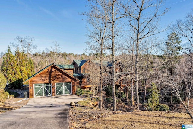 log cabin with a garage