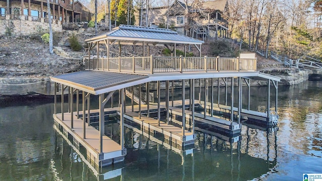 view of dock with a water view