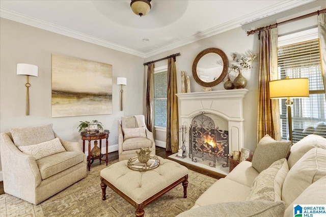 sitting room featuring hardwood / wood-style floors, ceiling fan, and ornamental molding