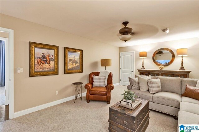 living room with light colored carpet and ceiling fan