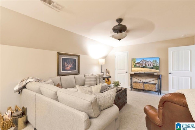 home theater with ceiling fan, lofted ceiling, and carpet floors