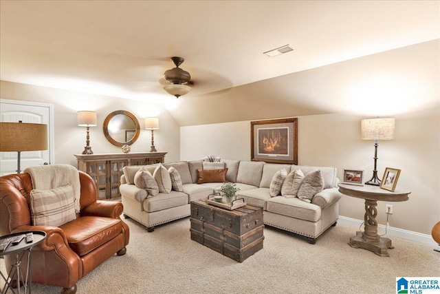 carpeted cinema featuring ceiling fan and vaulted ceiling