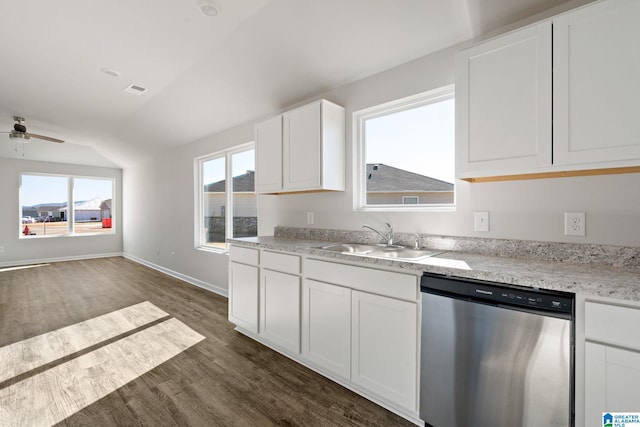 kitchen featuring dishwasher, a sink, a ceiling fan, dark wood finished floors, and vaulted ceiling