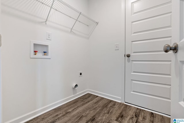 laundry area with baseboards, laundry area, dark wood finished floors, electric dryer hookup, and hookup for a washing machine