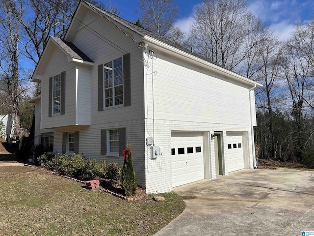 view of side of property featuring a garage