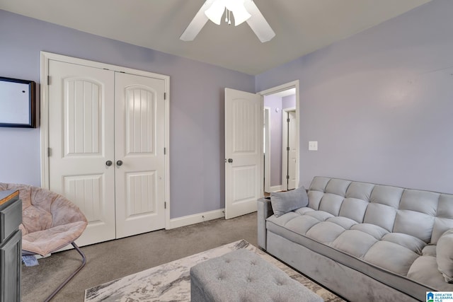 living room featuring light colored carpet and ceiling fan