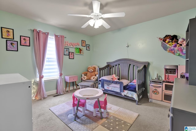 carpeted bedroom with ceiling fan