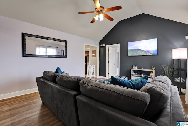 living room featuring hardwood / wood-style flooring, ceiling fan, and lofted ceiling