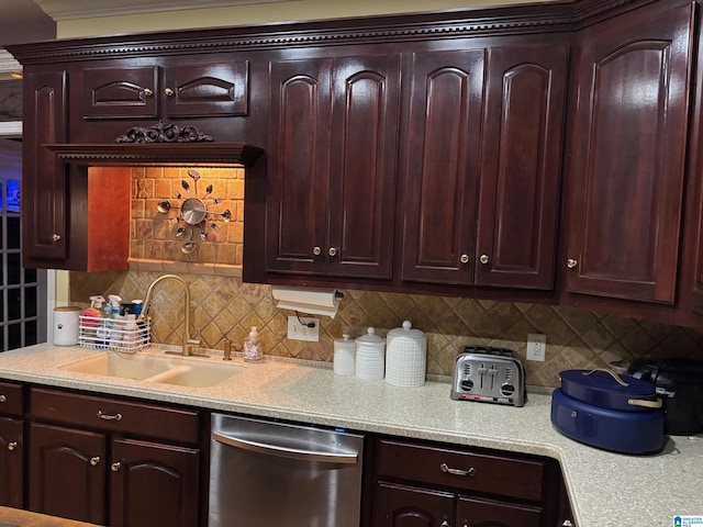 kitchen with decorative backsplash, dishwasher, and sink