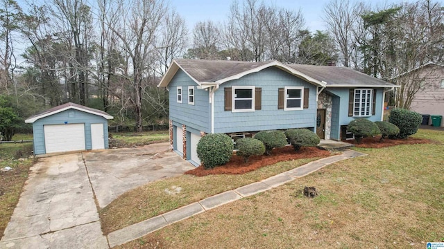 view of front facade with a front yard and a garage