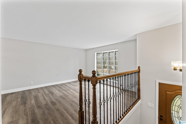 stairs with wood-type flooring