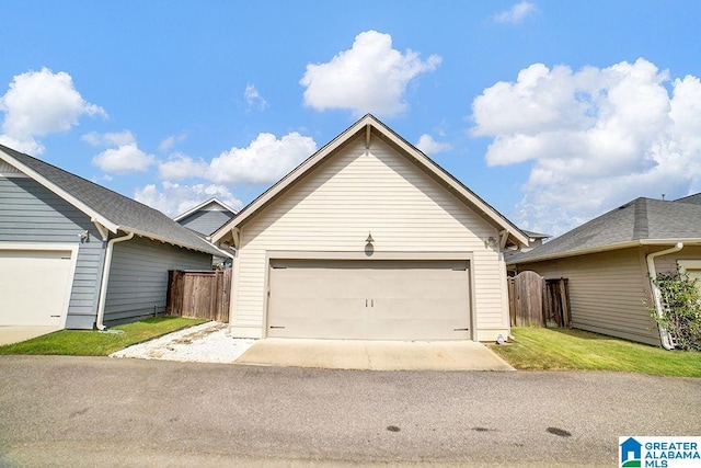 view of front of home with an outbuilding and a garage