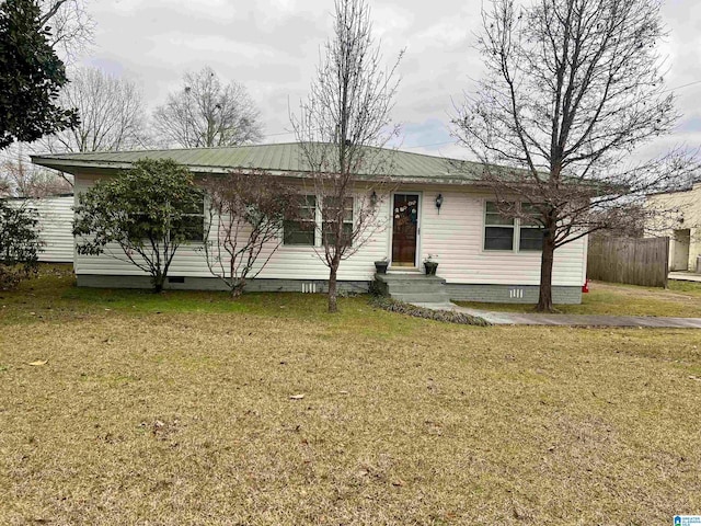 ranch-style home with a front yard