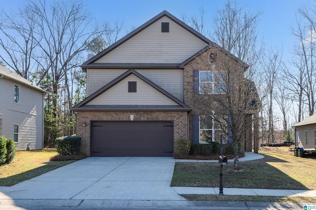 view of front facade with a garage and a front lawn