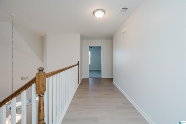 hall featuring light hardwood / wood-style floors