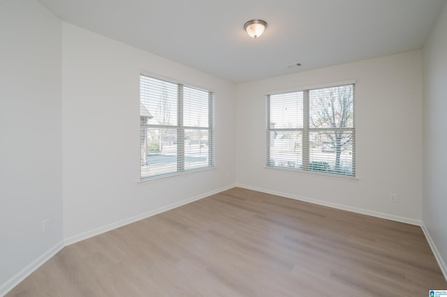 empty room featuring light hardwood / wood-style floors