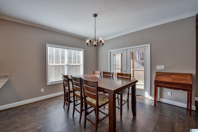 dining room with french doors, an inviting chandelier, plenty of natural light, and ornamental molding