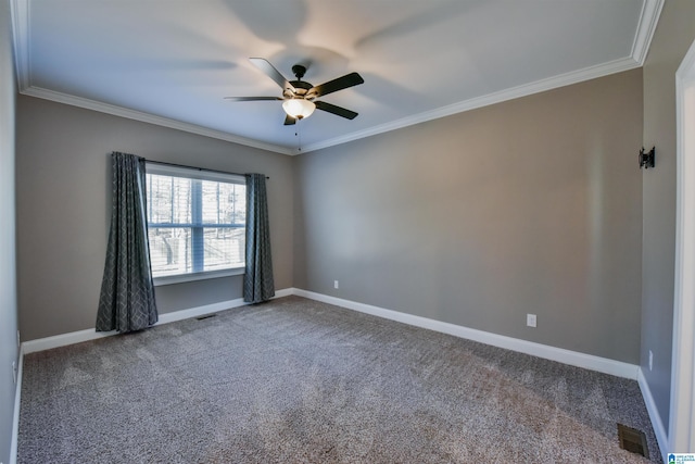 unfurnished room with carpet floors, ceiling fan, and ornamental molding