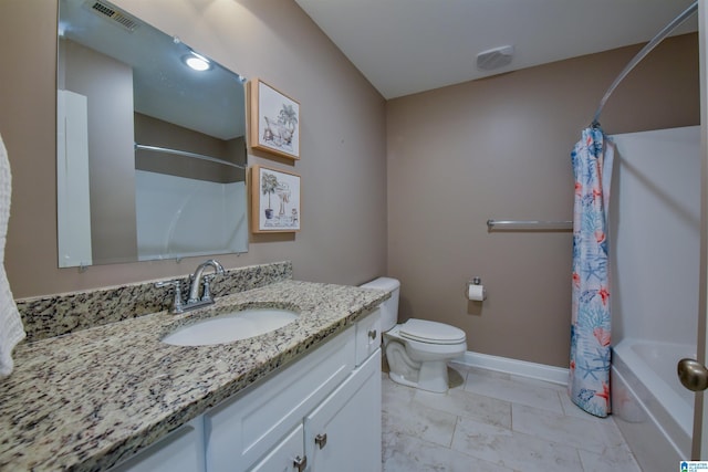 full bathroom featuring vanity, toilet, and shower / bath combo with shower curtain