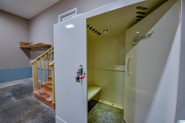 bathroom with concrete floors