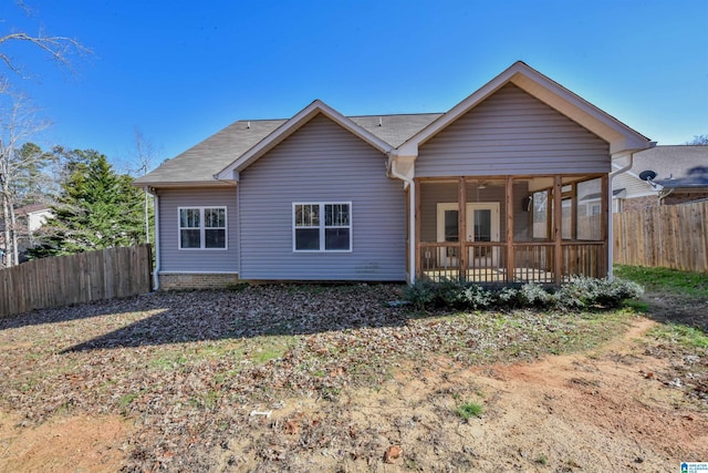 back of property featuring a sunroom